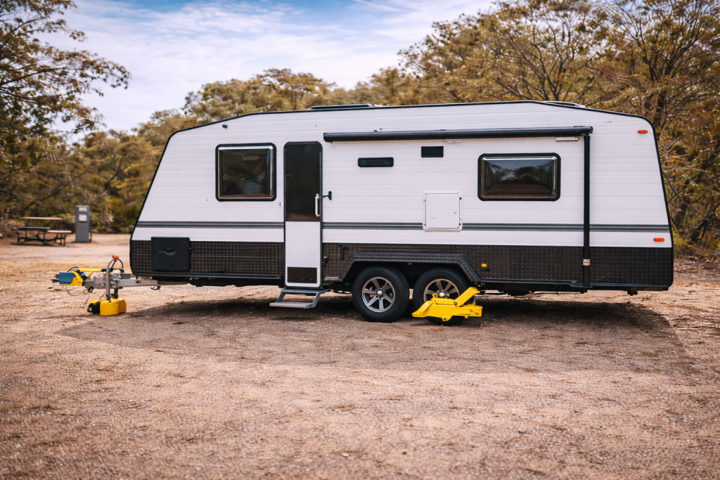 Close-up of a caravan hitch lock securing the coupling to prevent unauthorised towing.”
