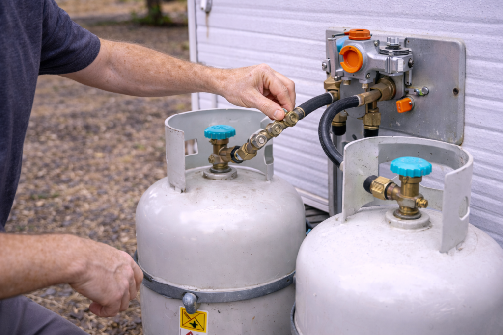  Inspecting caravan gas bottles and regulator 