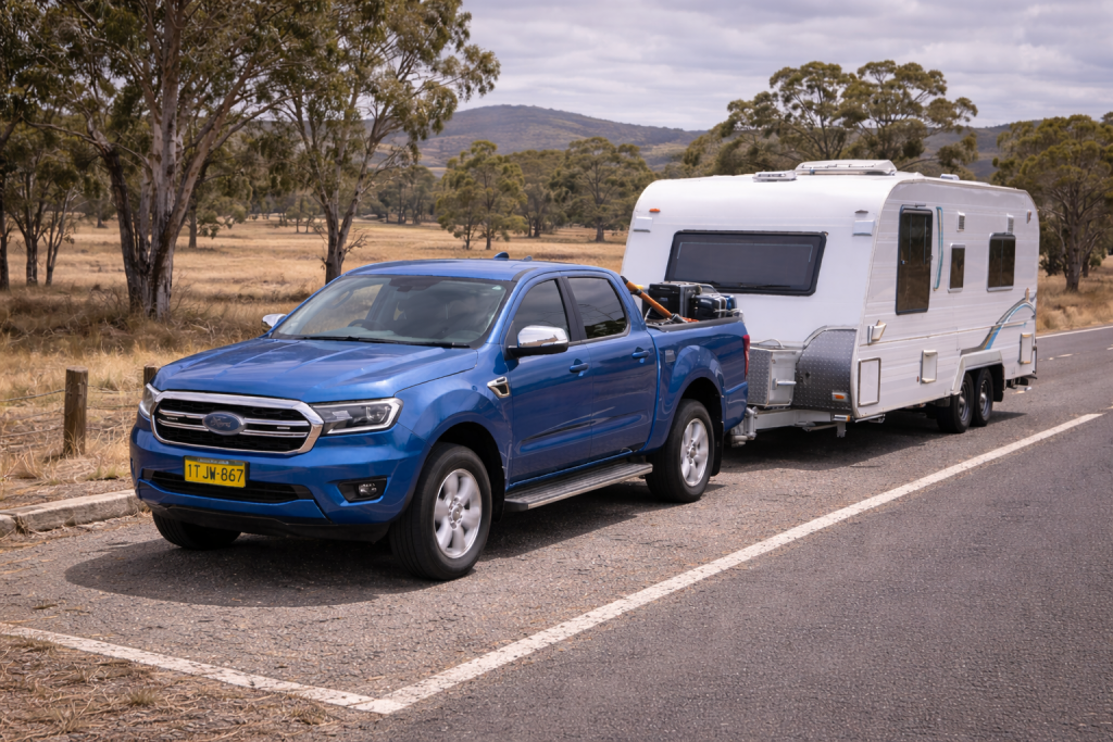 Dual cab ute towing a caravan in Australia