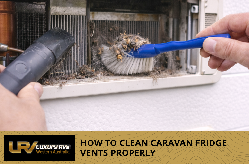 Exterior view of a caravan’s upper and lower fridge vents mounted on the vehicle wall.